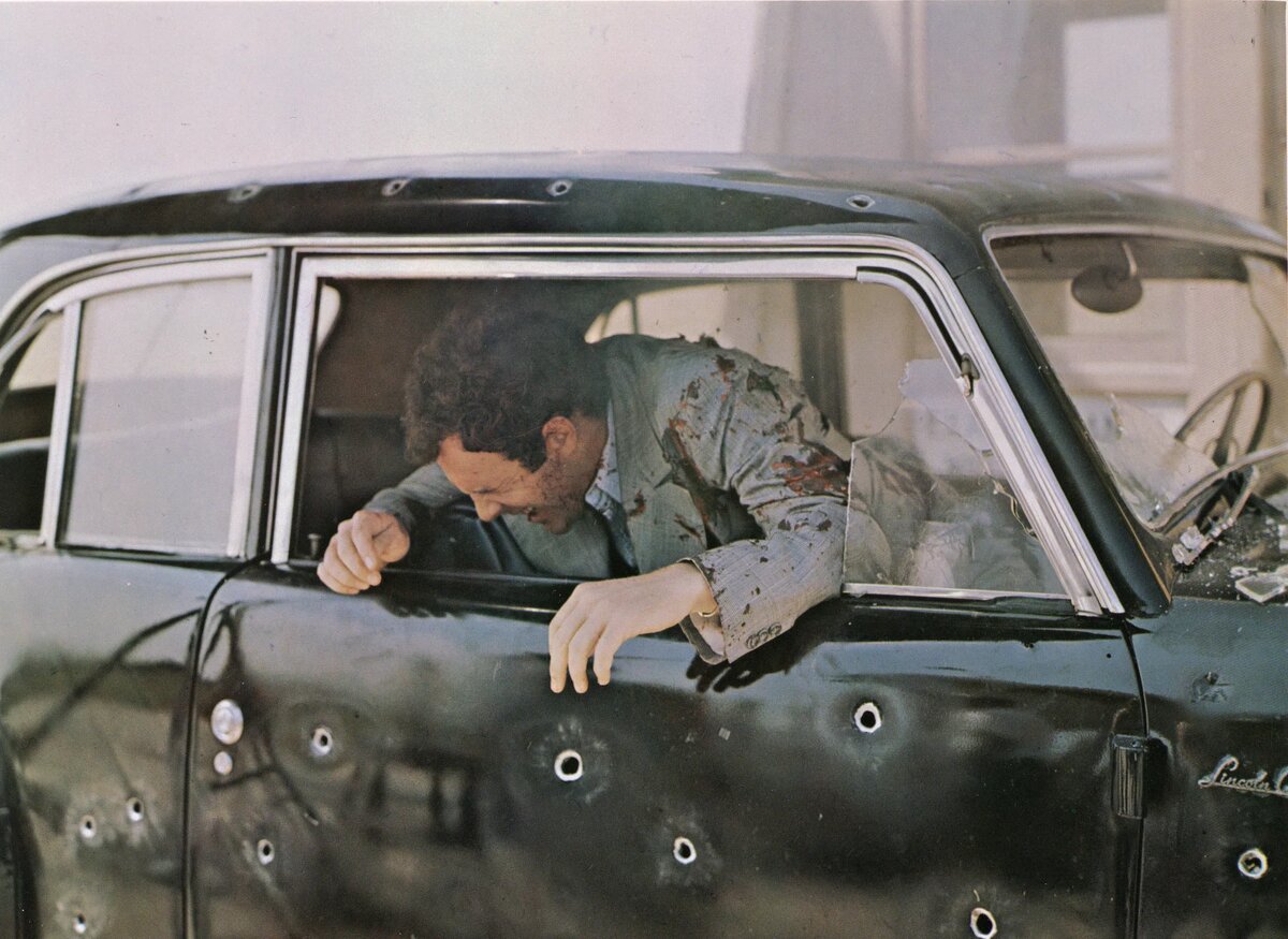 Теперь придется машину чинить. Кадр из фильма "Крестный отец" 1972 г.