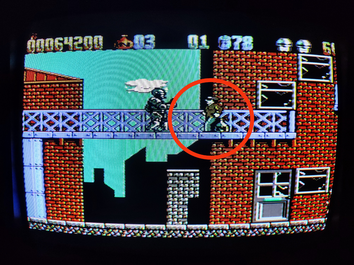 Фото сделаны мной. На фото игра RoboCop2. Оригинал игры "RoboCop 2" был разработан и издан Data East (аркада), Ocean Software в 1990г. для Amiga , Amstrad GX4000 , Atari ST, Commodore 64, Game Boy, NES, ZX Spectrum. Директор Мэн Тайко (аркада), программисты Такааки Иноуэ, Ясухико Номура, Масао Ишикава. Фото демонстрирует начальную заставку игры, а так же общий визуальный фон игры. Подробнее об этом рассказано в статье. Все материалы принадлежат правообладателям и размещены исключительно в информационных целях.