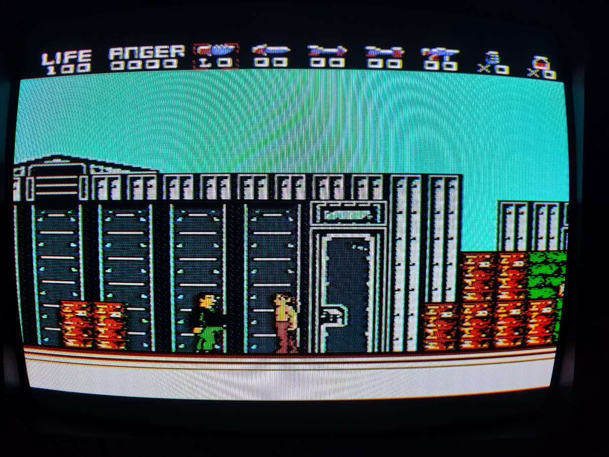 Фото сделаны мной. На фото игра . Оригинал игры "Rambo" был разработан Pack-In-Video и издан Pack-In-Video, Acclaim в 1987г. для NES. Дизайнер Акихиро Токита. Фото демонстрирует начальную заставку игры, а так же общий визуальный фон игры. Подробнее об этом рассказано в статье. Все материалы принадлежат правообладателям и размещены исключительно в информационных целях.