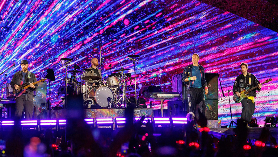 Coldplay во время одного из концертов турне Music of the Spheres (Источник: Dave Simpson / WireImage / Getty Images)