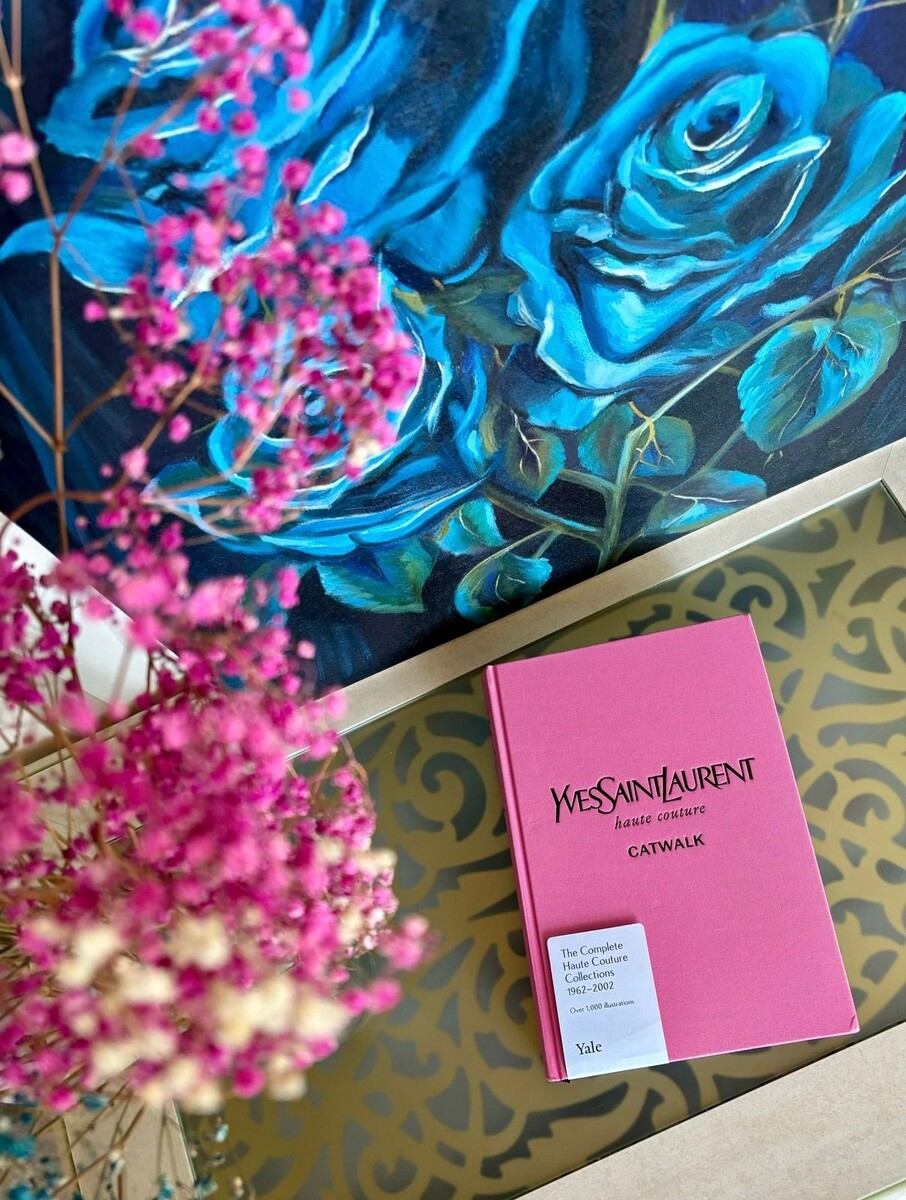На фото представлена моя первая картина маслом Blue roses и книга YSL Catwalk