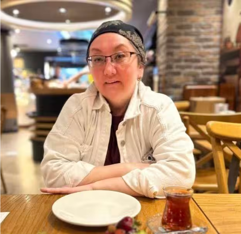 Выпускница программы подготовки фасилитаторов открытого диалога 
Айнура Бикирова