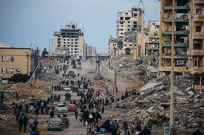    EPA/MOHAMMED SABER: Жители сектора Газа получили возможность вернуться на свои земли после заключения соглашения о прекращении огня Израиля с палестинским ХАМАС