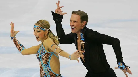 Олимпийские чемпионы в танцах на льду  Татьяна Навка и Роман Костомаров 