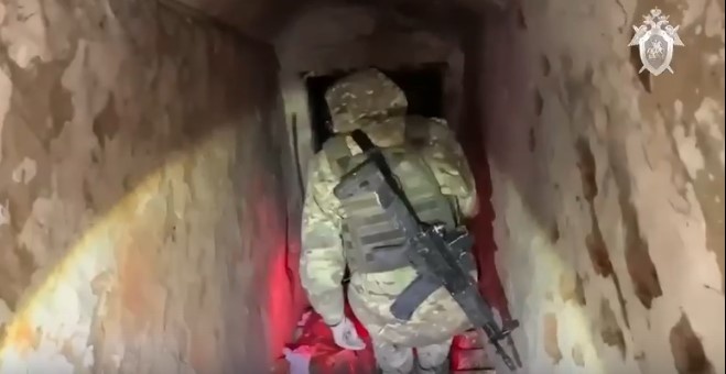 Скриншот видео Следственного Комитета РФ. В подвале найдены тела мирных жителей села Русское Поречное Курской области / Авторы: t.me/sledcom_press