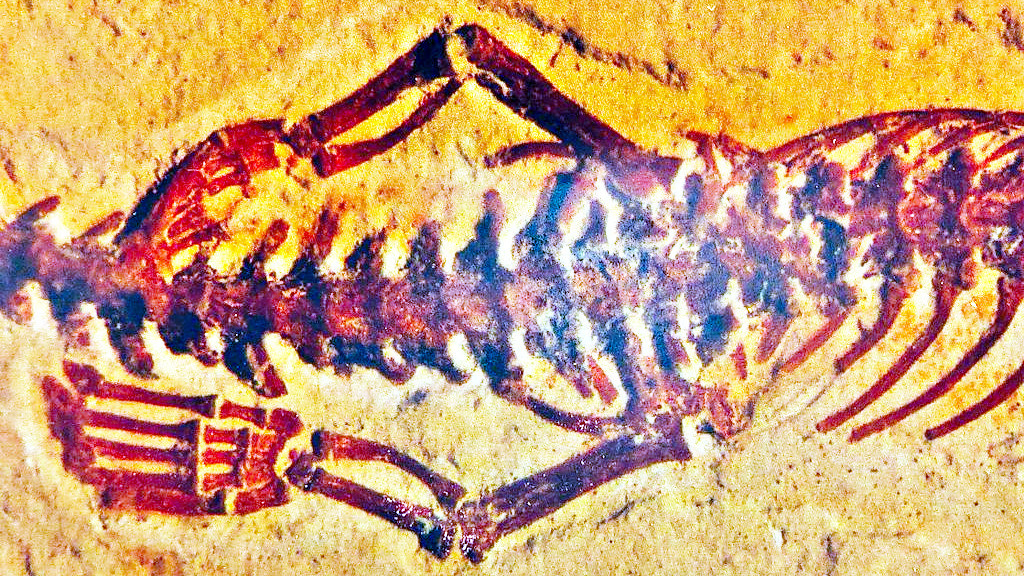 И при длинном змеином теле у него были лапки!