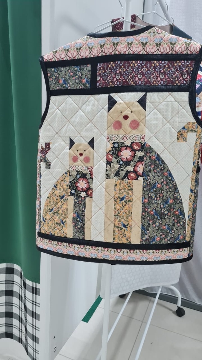 Спинка жилета.