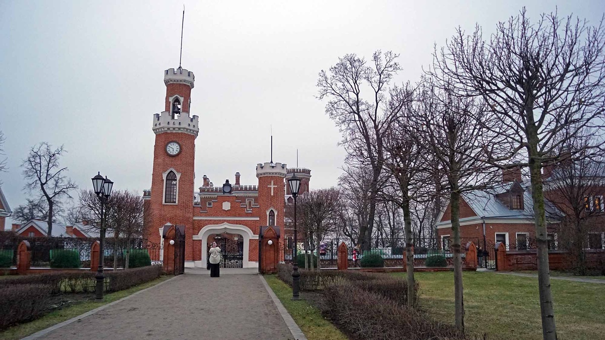 The front gates with turrets and a clock on the estate's grounds were recently restored.