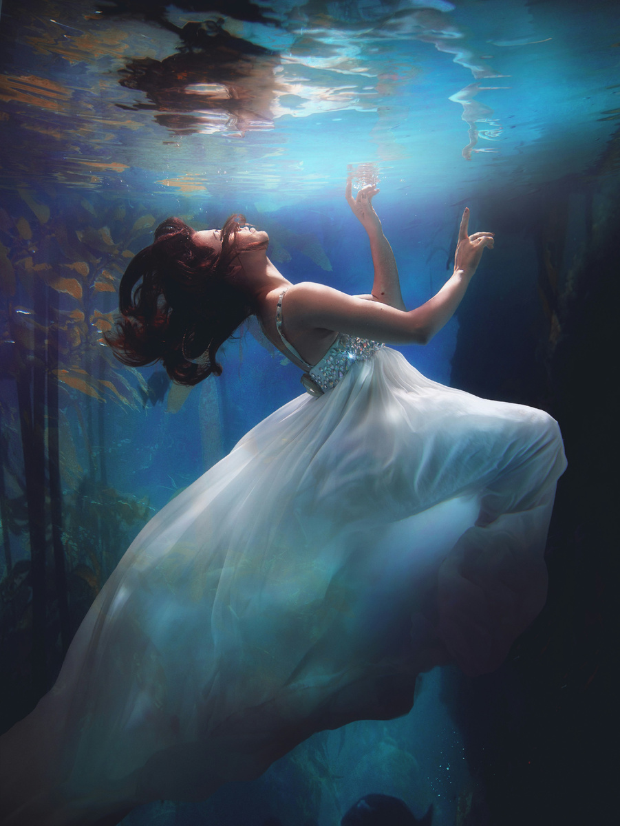 https://unsplash.com/photos/underwater-photography-of-woman-wearing-white-dress-apYiDRNa-pY