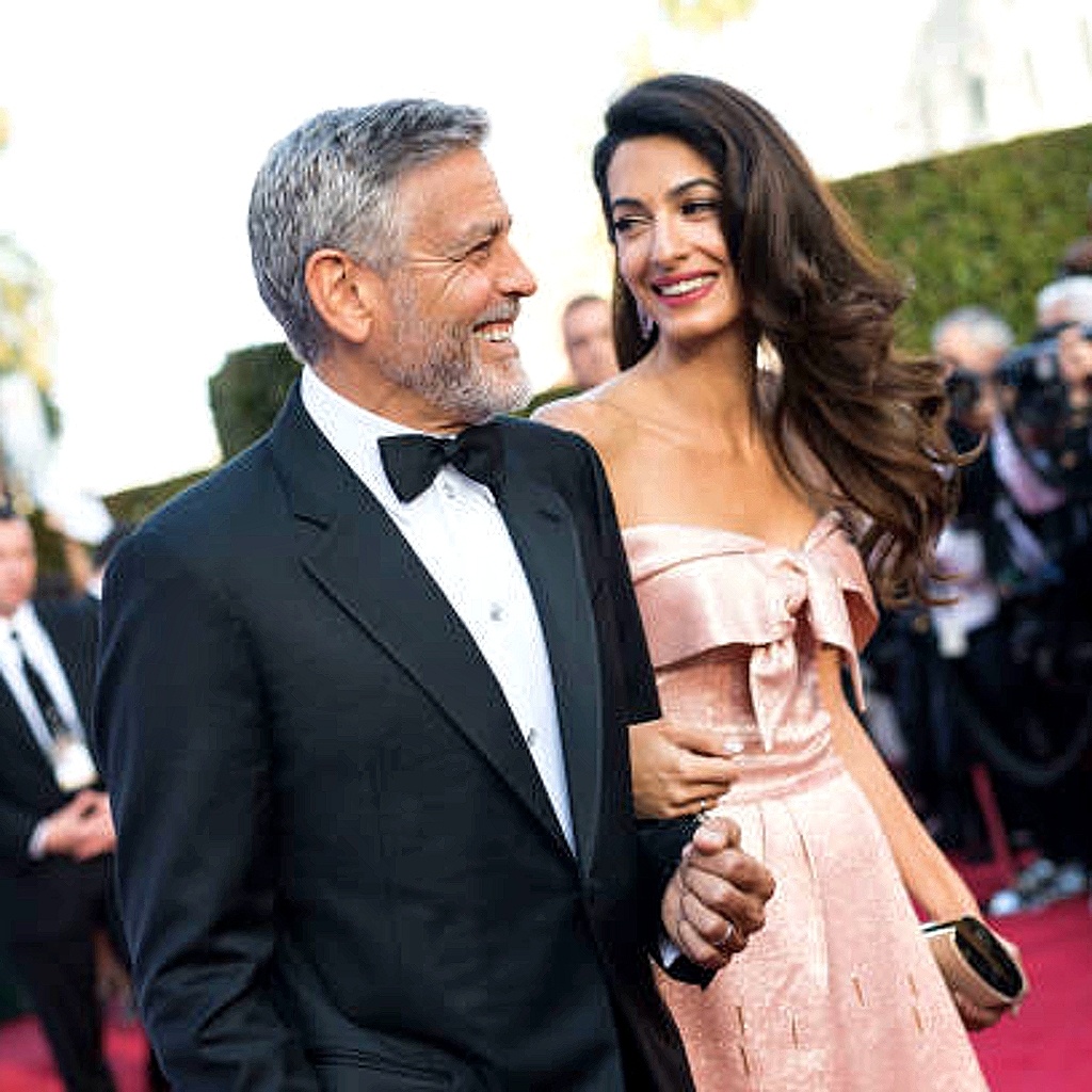 Джордж и Амаль Клуни на красной дорожке гала-концерта  Американского института кино,в Лос-Аеджелесе, 2018 г