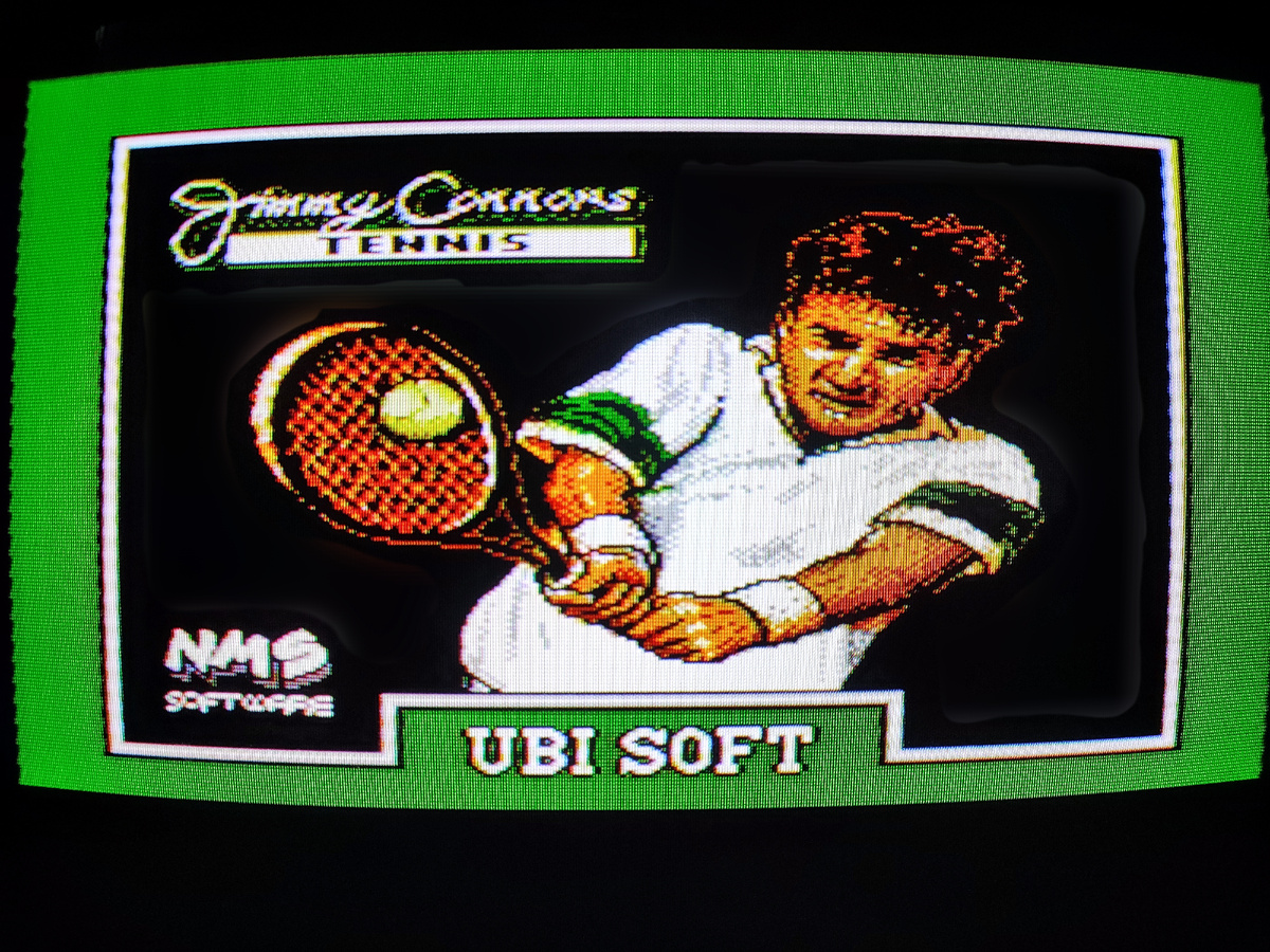 Фото сделаны мной. На фото игра Jimmy Connors Tennis. Оригинал игры "Jimmy Connors Tennis" был разработан NMS Software (NES, Game Boy), Hand Made Software (Atari Lynx) и издан Ubi Soft в 1993г. Фото демонстрирует начальную заставку игры, а так же общий визуальный фон игры. Подробнее об этом рассказано в статье. Все материалы принадлежат правообладателям и размещены исключительно в информационных целях.