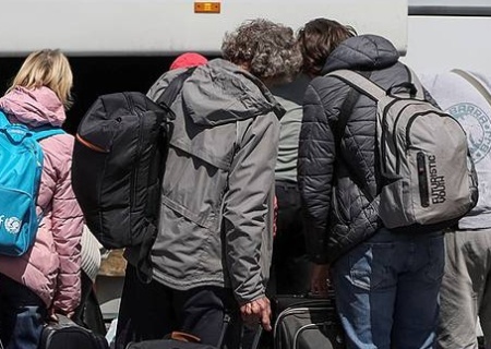    Украинские переселенцы бегут из Польши в Германию