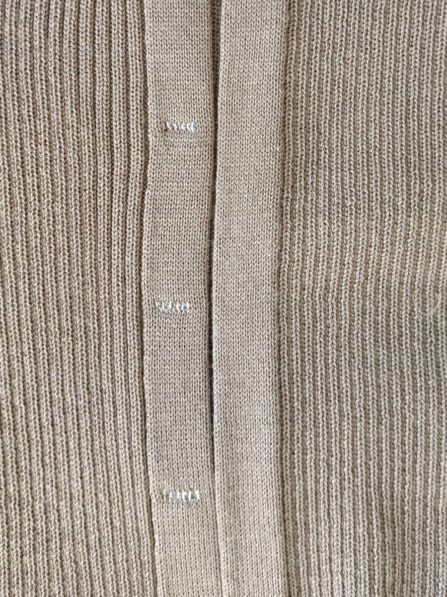 Края петель зафиксированы бросовой нитью до ВТО