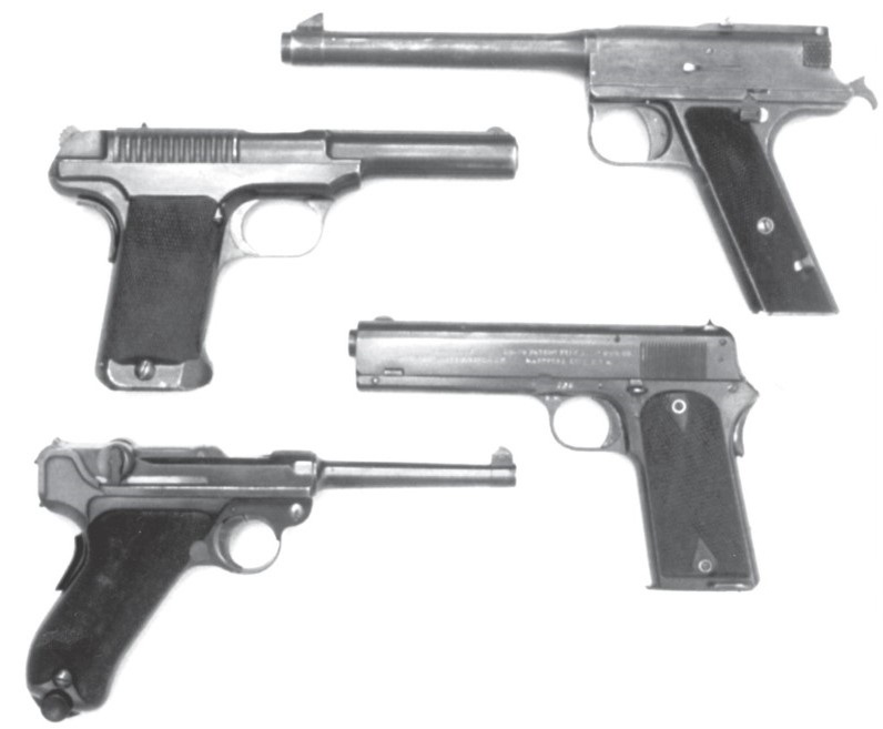 Пистолеты, представленные на конкурс. Сверху вниз: Грант-Хаммонд, Сэвидж, Кольт, Люгер.