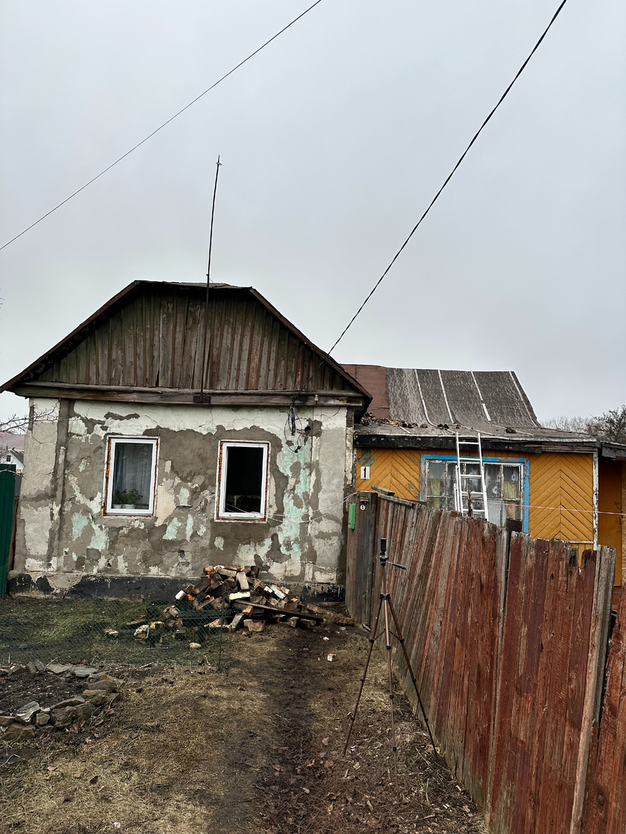 Дом после пожара.