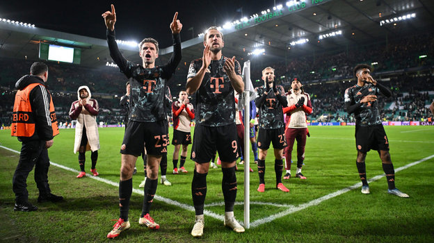    Томас Мюллер и Харри Кейн. AFP