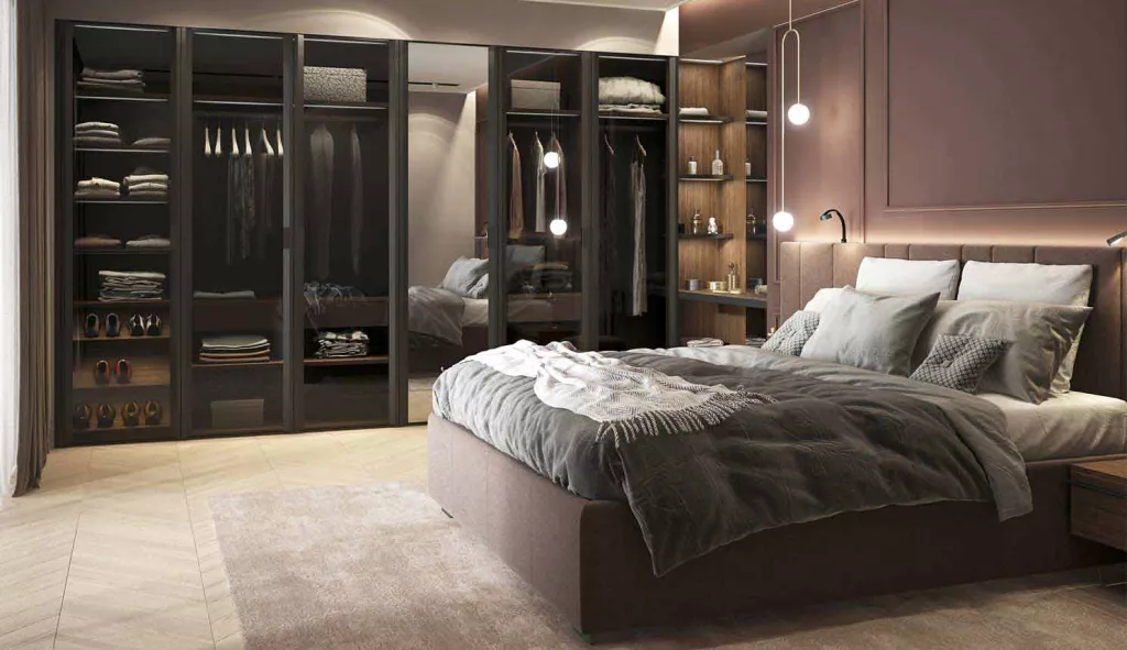 Шкафы вдоль одной стены при грамотном планировании позволяют разместить все необходимое, включая одежду на вешалках, обувь, постельное белье и принадлежности