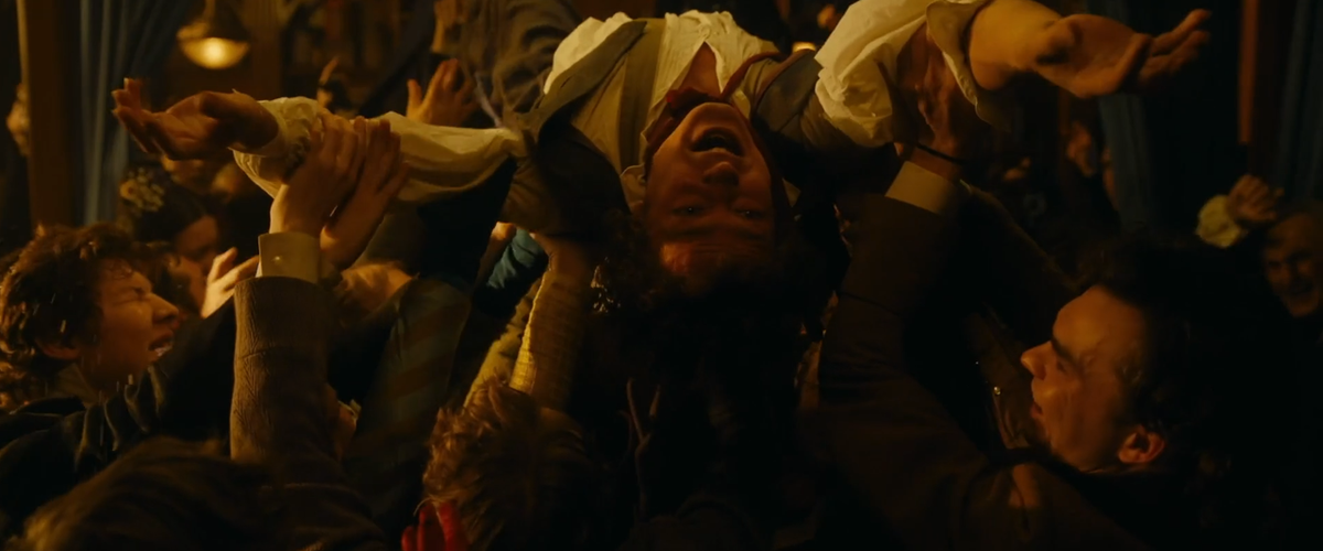 Пушкина несут на руках. Кадр из фильма