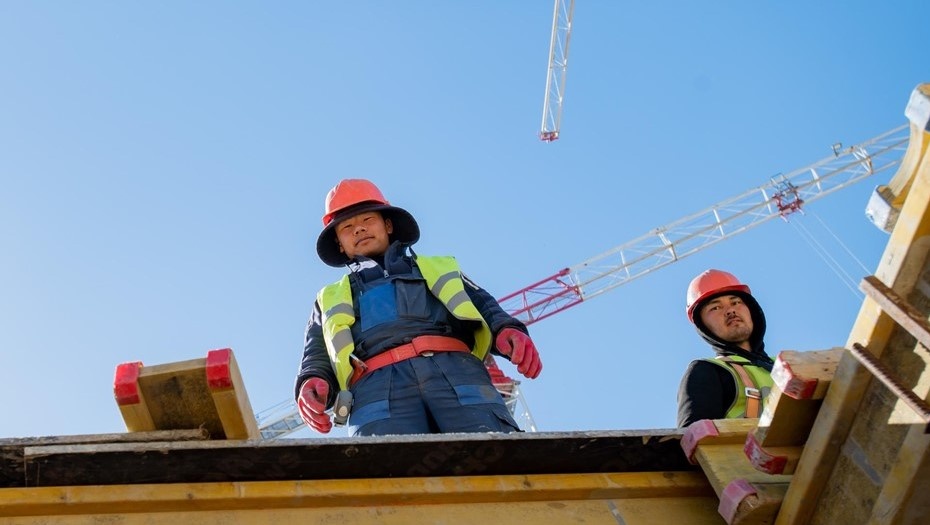    Иностранные работники на стройплощадке. Иллюстрация. Автор фото: Ермохин Сергей/"ДП"