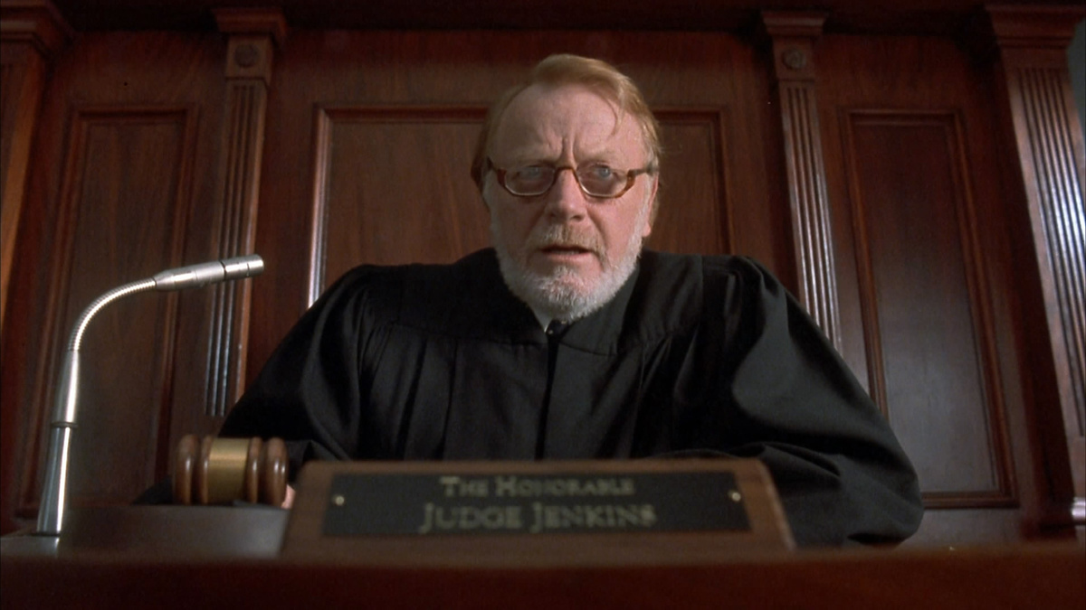 Пролистните изображение, чтобы увидеть следующий кадр из фильма «Пистолет в сумочка Бетти Лу» (1992)