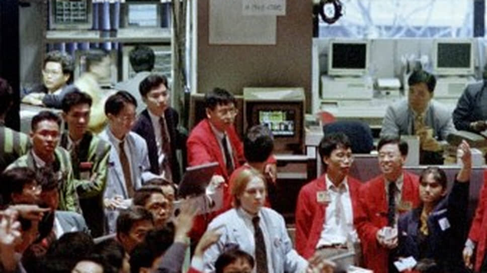 Сингапурская международная финансовая биржа. Здесь Ник Лисон играл по-крупному и проиграл — тоже по-крупному.📷Фото: Roslan RAHMAN / AFP