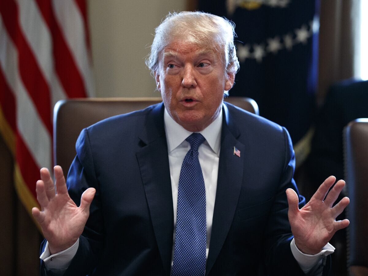    Президент США Дональд Трамп в Белом доме. 9 апреля 2018 © AP Photo / Evan Vucc