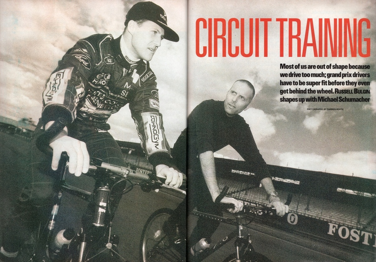 Многие из нас находятся не в форме, поскольку мы проводим слишком много времени за рулём; пилоты гран-при должны быть в прекрасной форме прежде, чем сесть за руль. Рассел Булгин упражняется вместе с Михаэлем Шумахером.