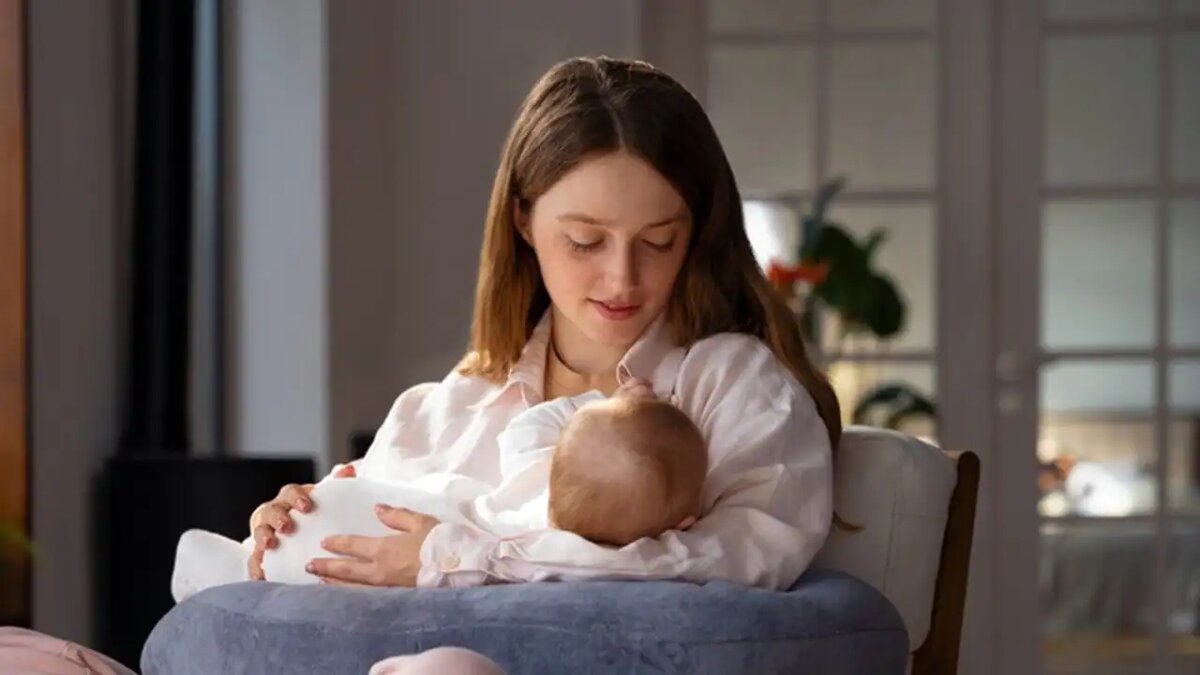    Кормление грудью.