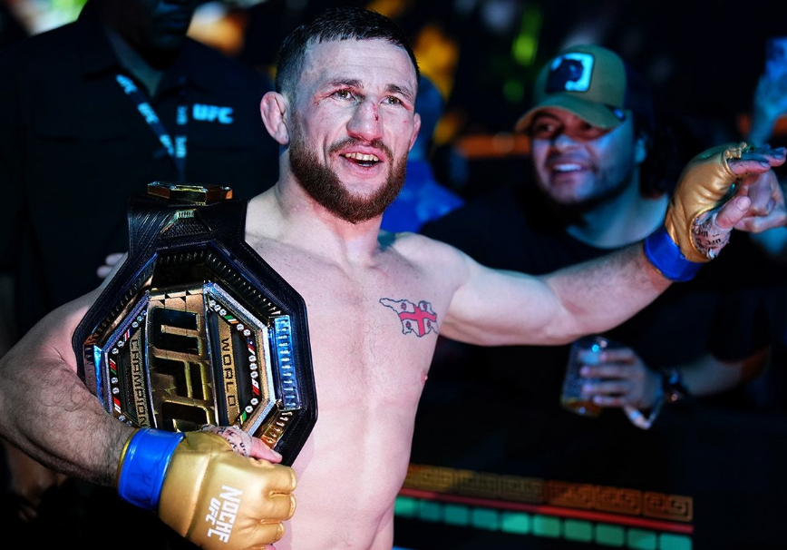 Мераб с поясом UFC