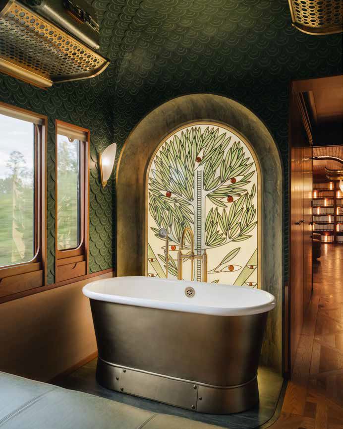 Bathtub and dining area at L’Observatoire Suite by JR, Venice Simplon-Orient-Express, a Belmond train, Europe