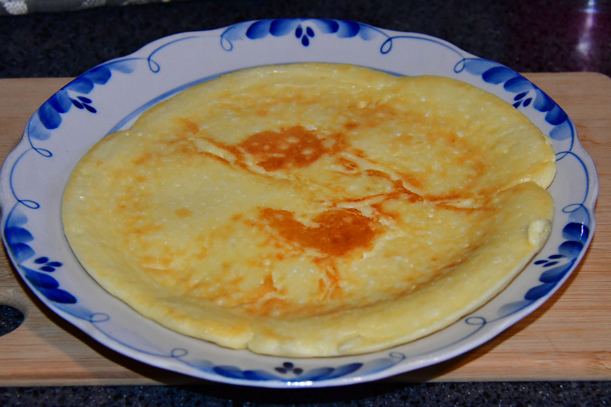 Сырник со сметаной