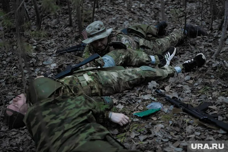 Участница спецоперации выносила тело своего мужа с поля битвы
Фото: Руслан Яроцкий © URA.RU