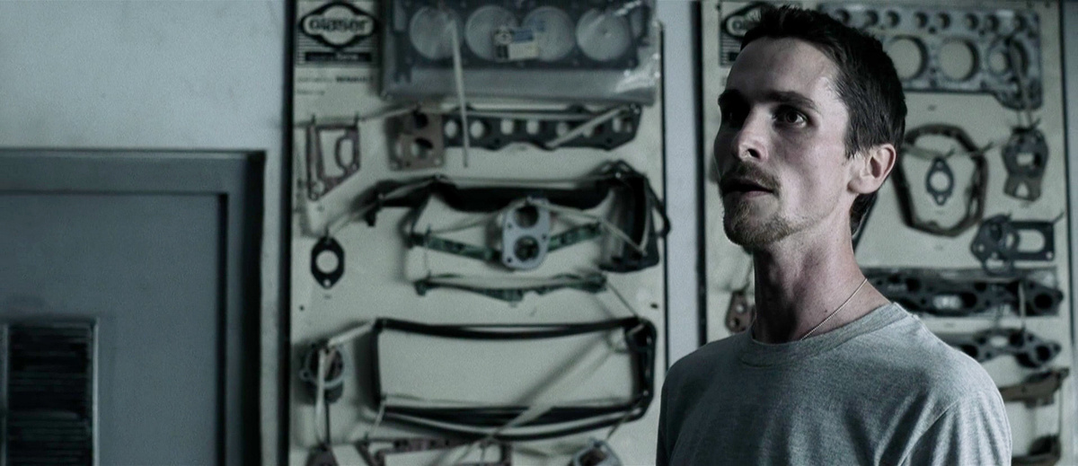 Кадр из фильма «Машинист» (2004)