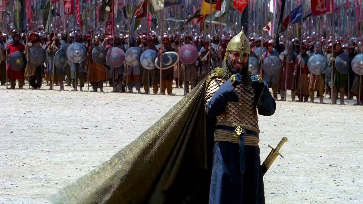 После триумфальной победы у Рогов Хаттина султан Салах ад-Дин мог смело дать волю самым радостным своим эмоциям. Здесь и далее тексту размещены кадры из фильма из «Царство небесное» (Производство: США, Великобритания и Германия. 2005 год; режиссёр – Ридли Скотт, автор сценария – Уильям Монахан). В роли Саладина – сирийский актёр Гассан Массуд