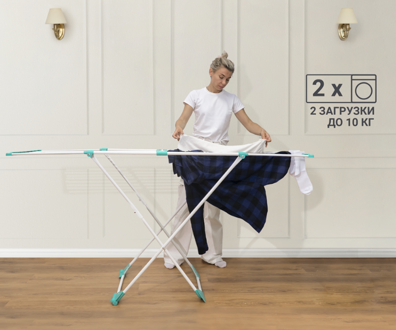 Напольная сушилка выдерживает нагрузку до 10 кг, что позволяет сушить постельное белье.