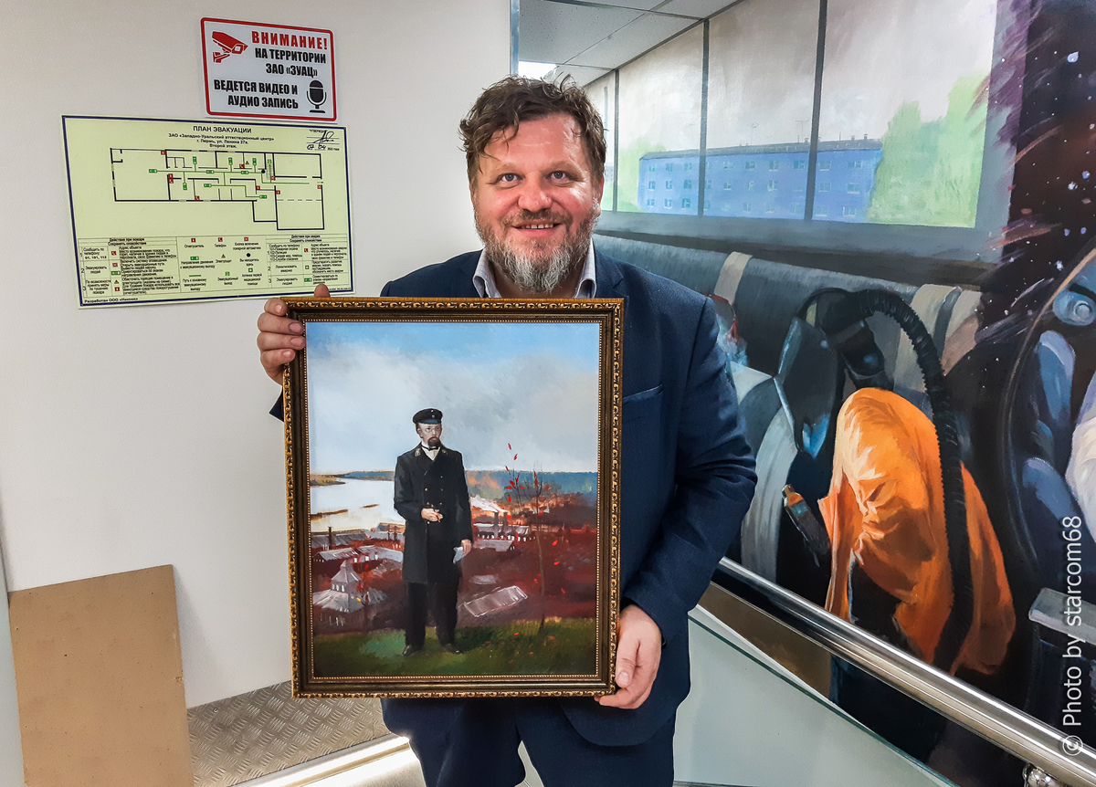 Алексей Сигаев с портретом Н.Г.Славянова в офисе ЗУАЦ
