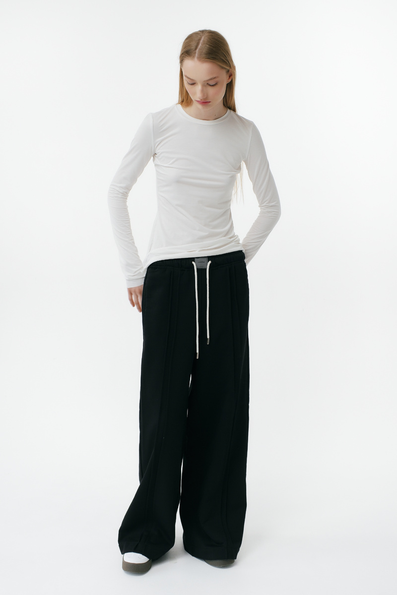 Брюки с акцентными стрелками и расслабленным силуэтом Inache в чёрном цвете