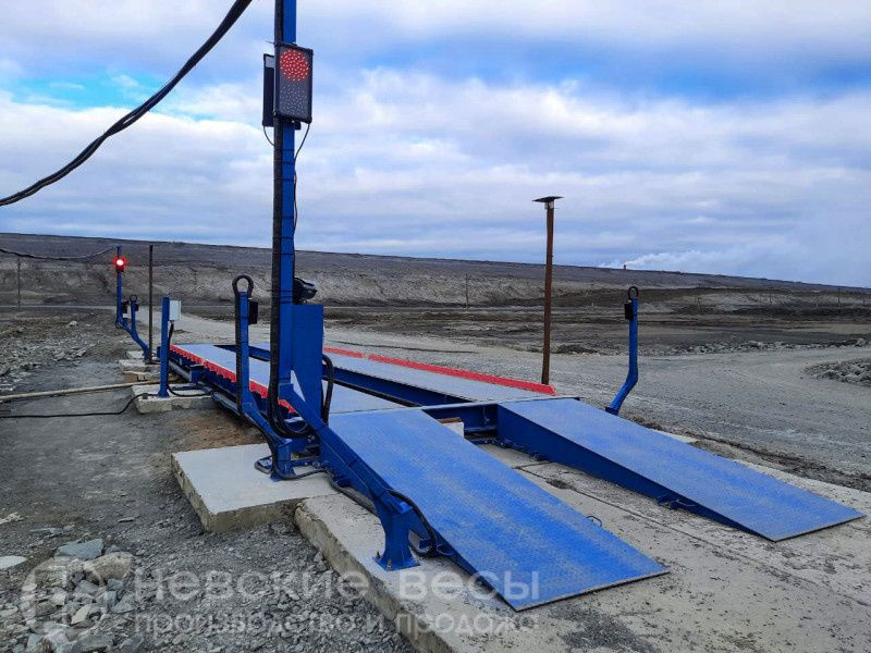 Весы производства компании "Невские весы" с интегрированной автоматизацией.