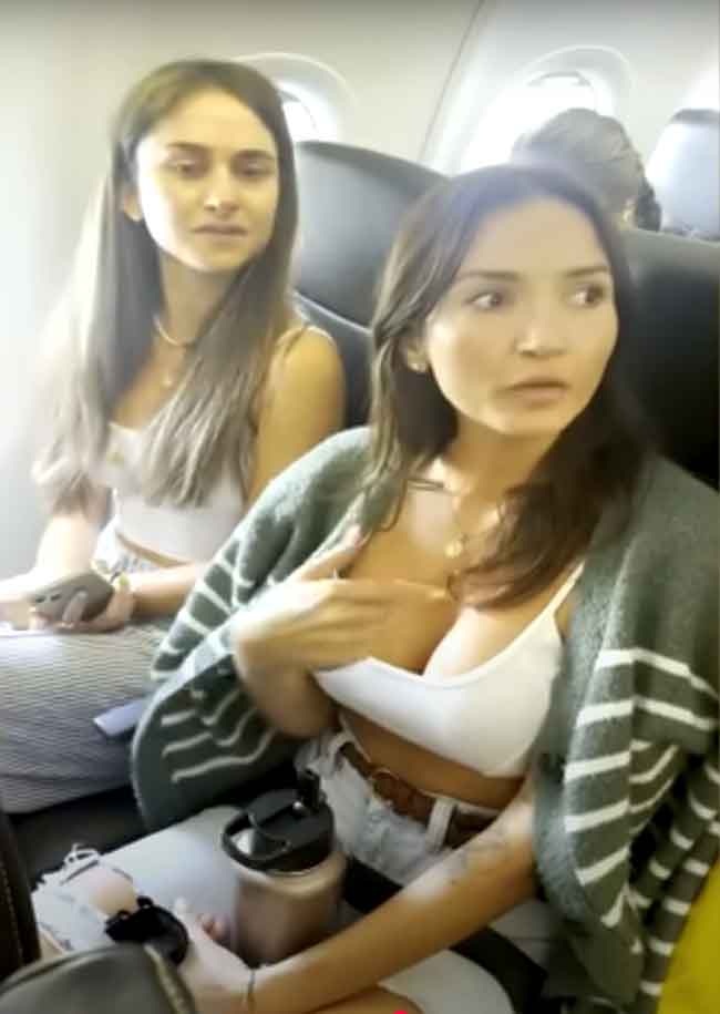 Пассажирки-нарушительницы пытаются поспорить о длине своих топов YouTube