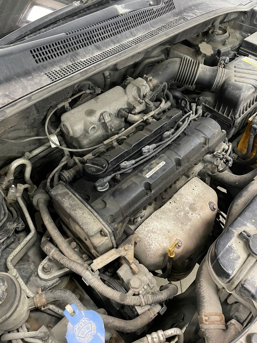Под капотом Kia Sportage двигатель 2.0 G4GC