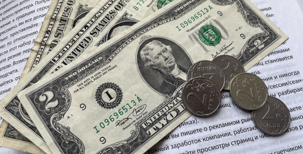    Доллар