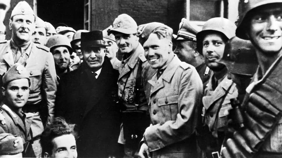 «Этот отряд получил задачу — освободить и похитить МУССОЛИНИ» (на фото — Скорцени (слева) со своими диверсантами после захвата гостиницы, где содержался Муссолини (в черном пальто), 12 сентября 1943 года).📷Фото: Farabola / Leemage / AFP