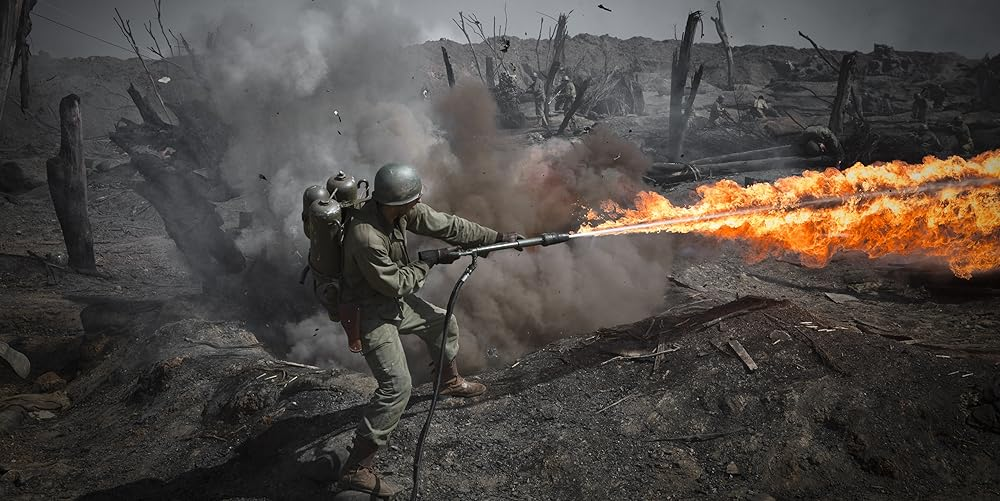 Кадр из фильма «Hacksaw Ridge». Режиссер: Мэл Гибсон. Производство: AI-Film, Argent Pictures, Bliss Media, Cosmos Filmed Entertainment, Cross Creek Pictures, David Permut Productions, Demarest Media, Icon Productions, IM Global, Kilburn Media, Kylin Pictures, Pandemonium, Vendian Entertainment, Windy Hill Pictures. Прокат: WDSSPR