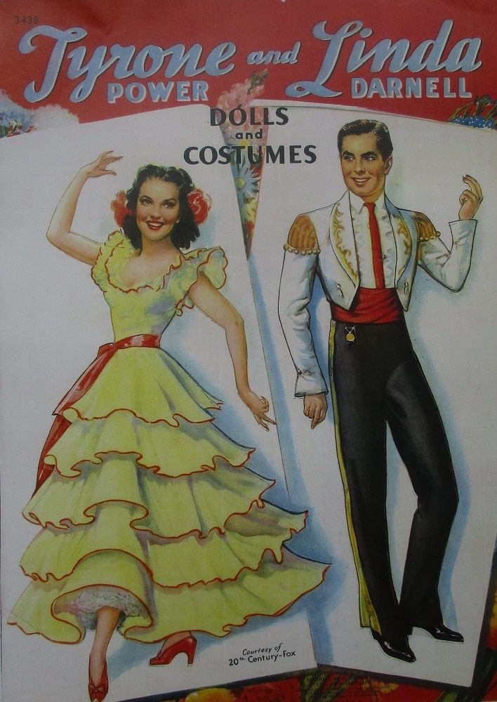 Передняя обложка с двумя куклами.