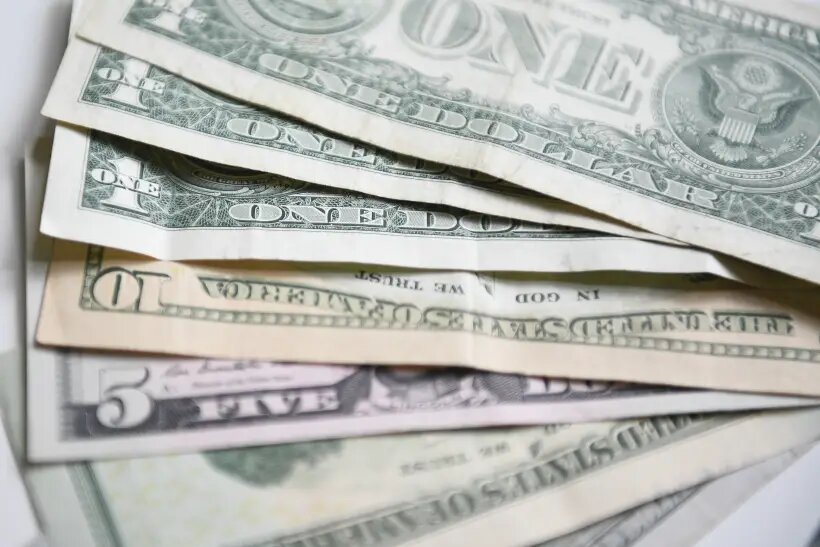     Денежные купюры США. © РИА Новости. Нина Зотина