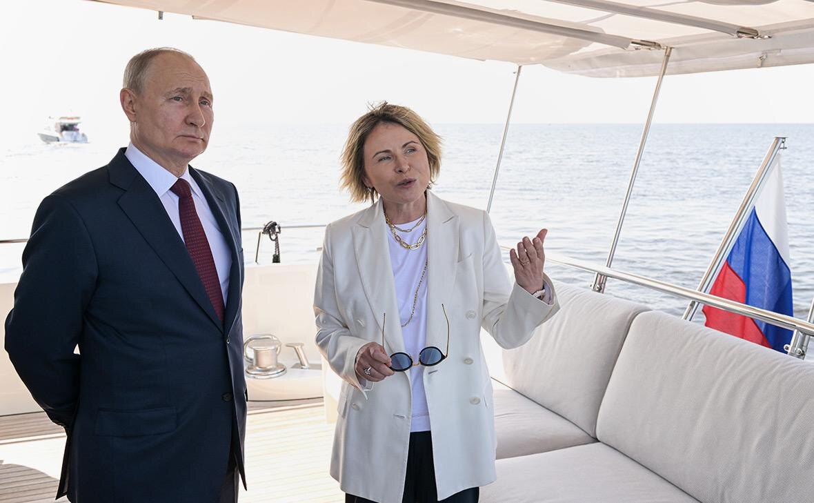    Владимир Путин и Елена Илюхина Фото: Павел Лисицын / ТАСС Георгий
