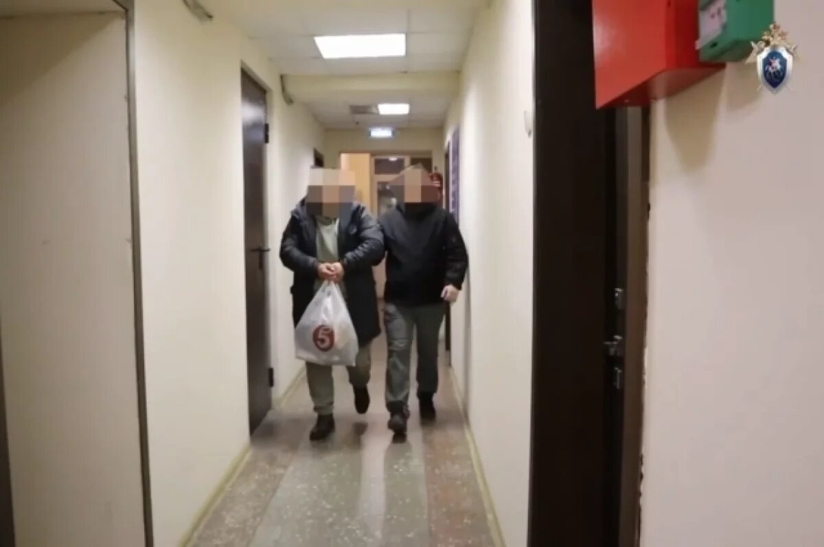    Рафаэля Илькаева ведут на допрос