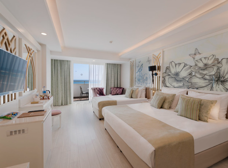 Фотография одного из номеров отеля Adalya Elite Lara. Изображение взято с сайта Travelata со страницы с описанием отеля.