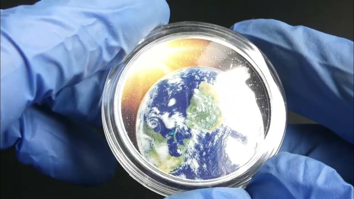 Самая загадочная монета в коллекции. Куполообразная серебряная монета Земля.