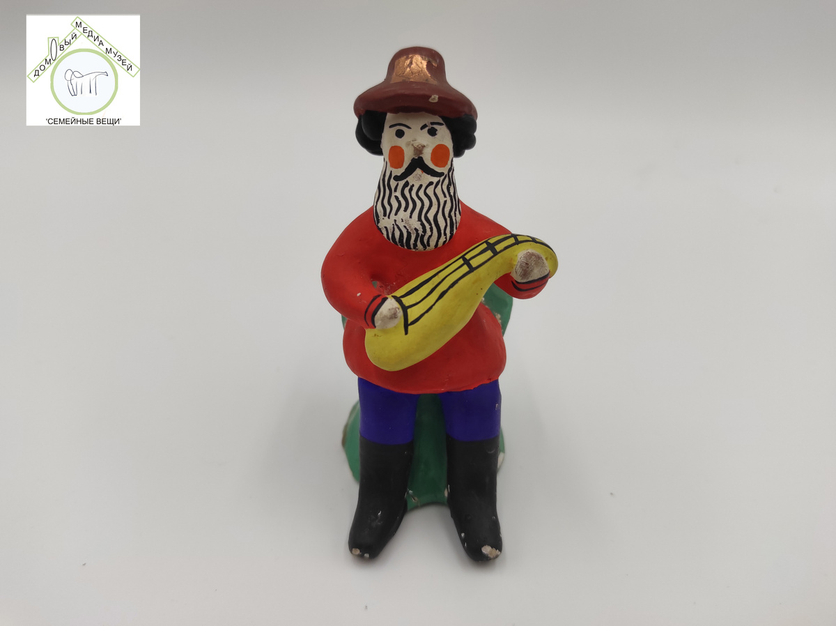 Дымковская игрушка. Автор: Порошина Н.П. Изделие 14 (1960-1970 гг.). Название отсутствует (предположительно "Гусляр"). 